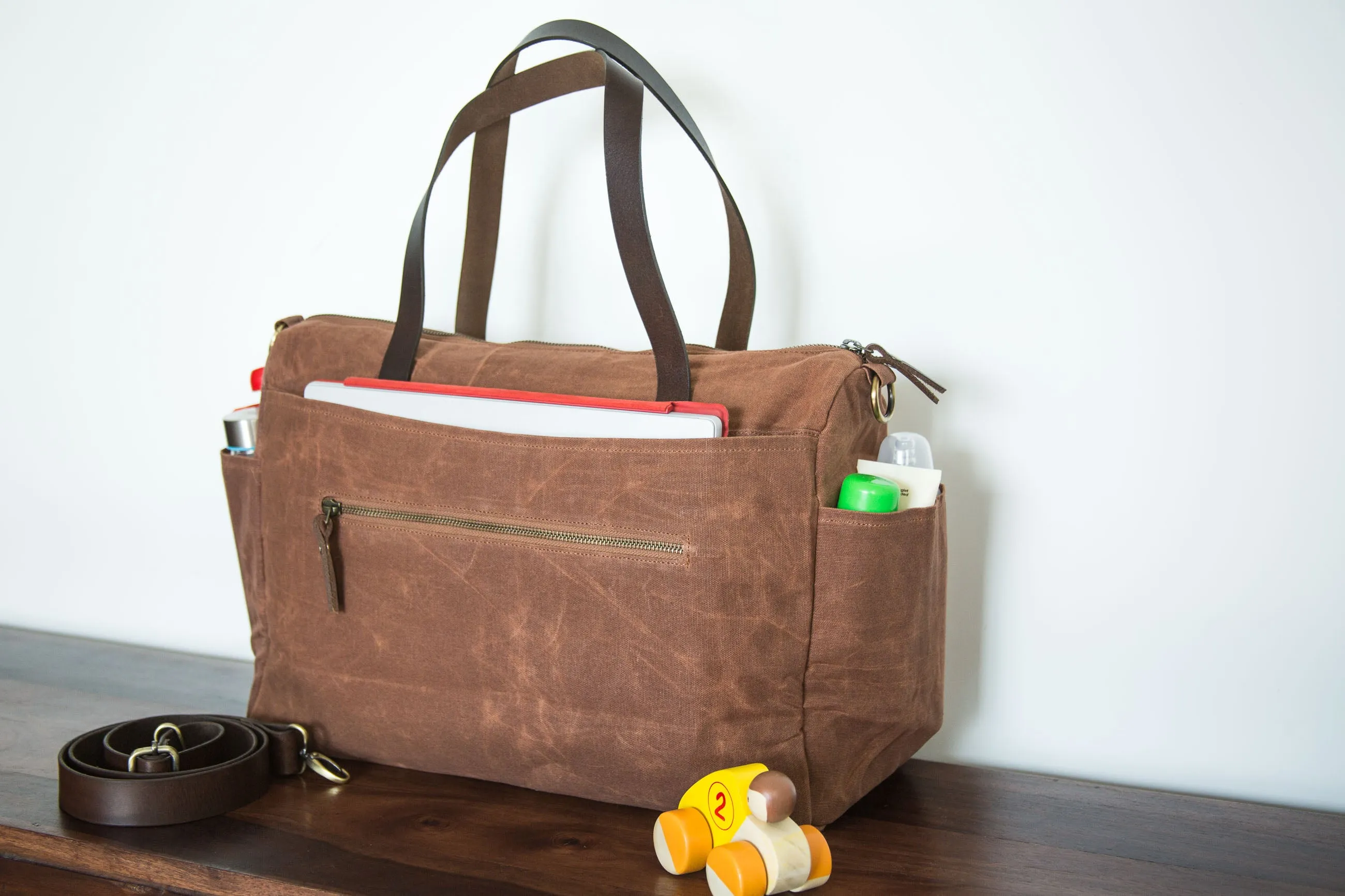 Pipa 11 Pocket Crossbody Diaper Bag Tote in Pecan Brown | Waxed Canvas & Leather